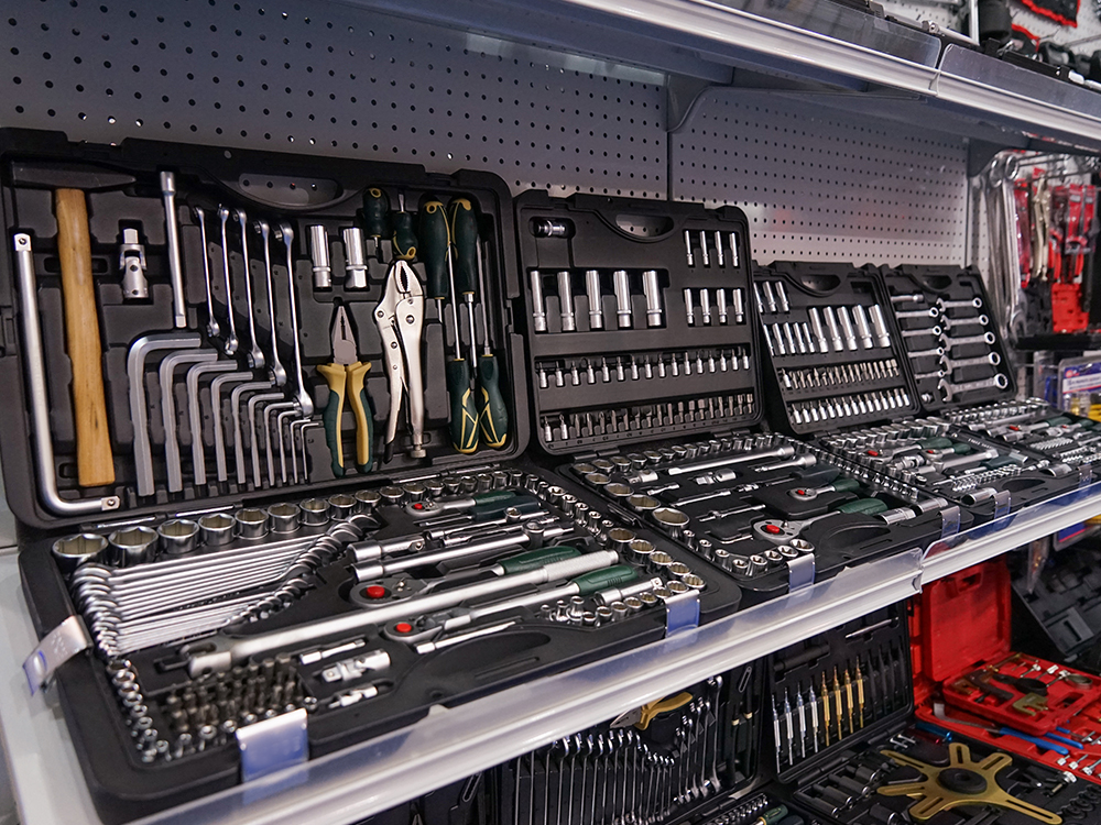 Hand tools laid out on a workbench